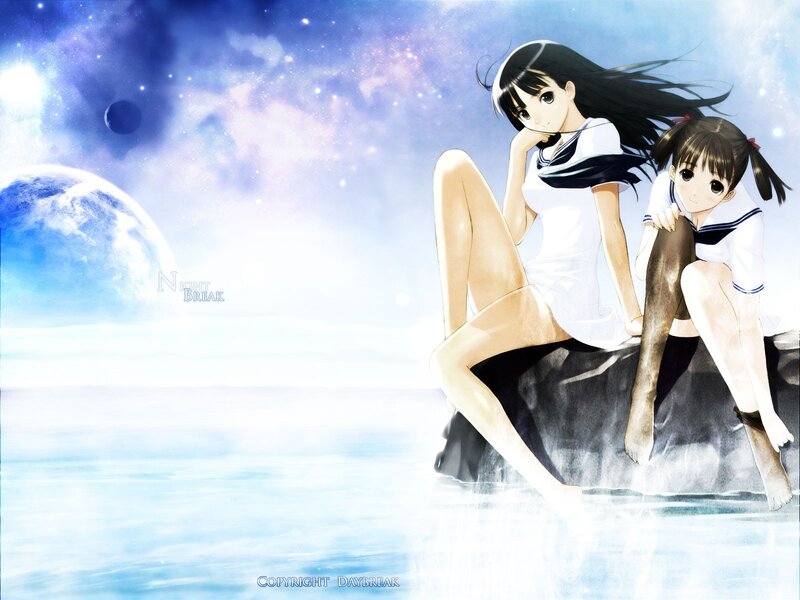 Two girls on a rock at night