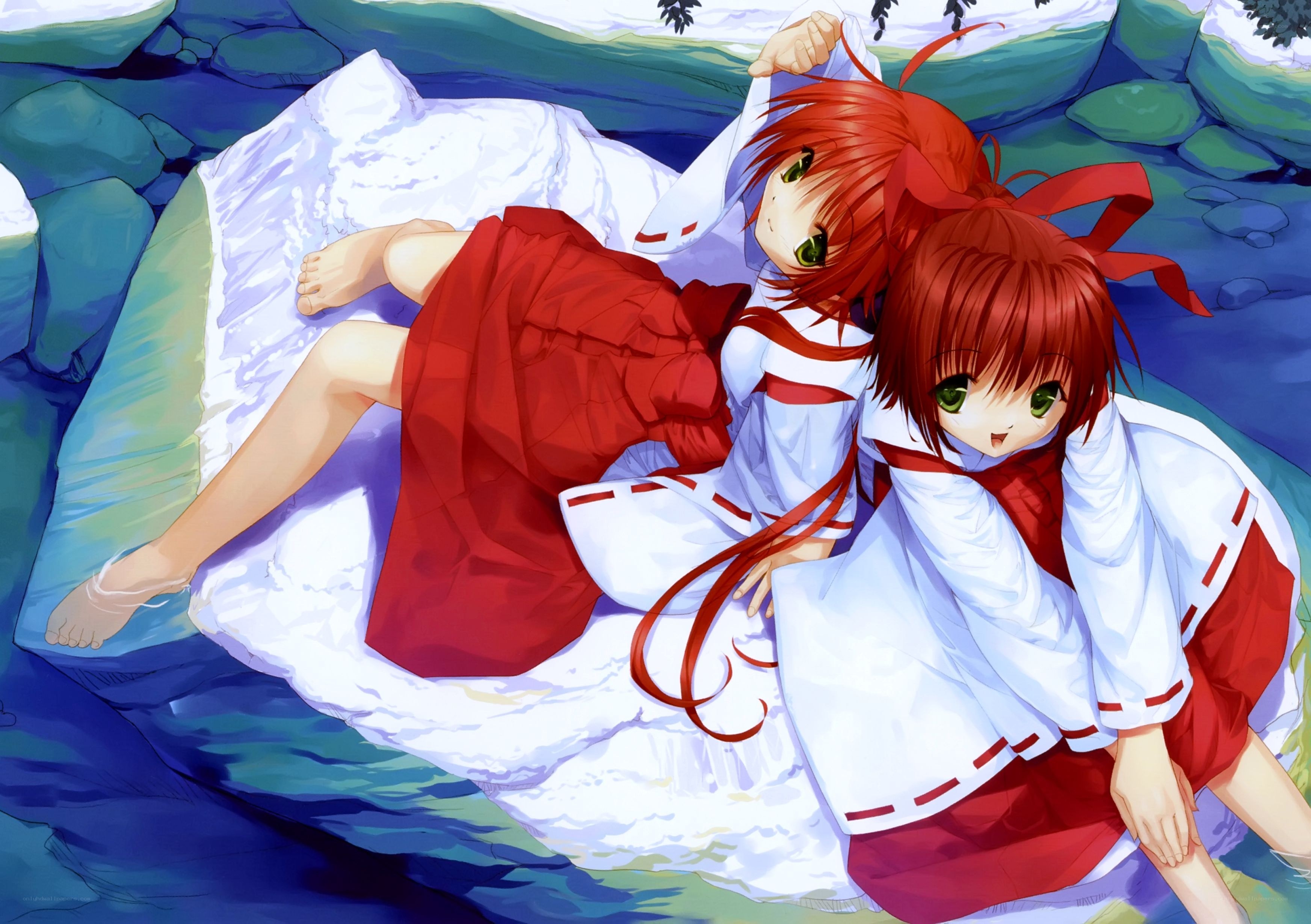 Two girls on a rock