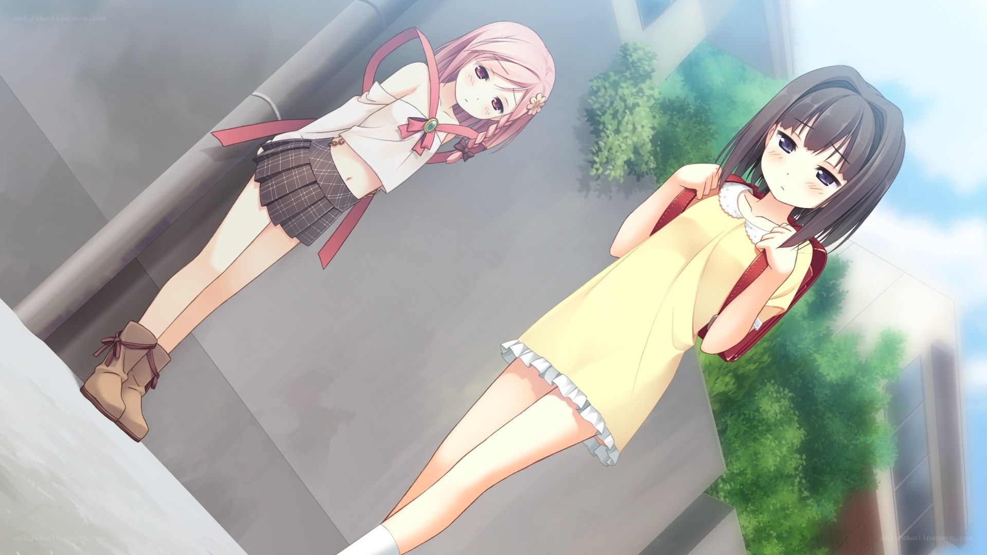 Two girls on a rooftop