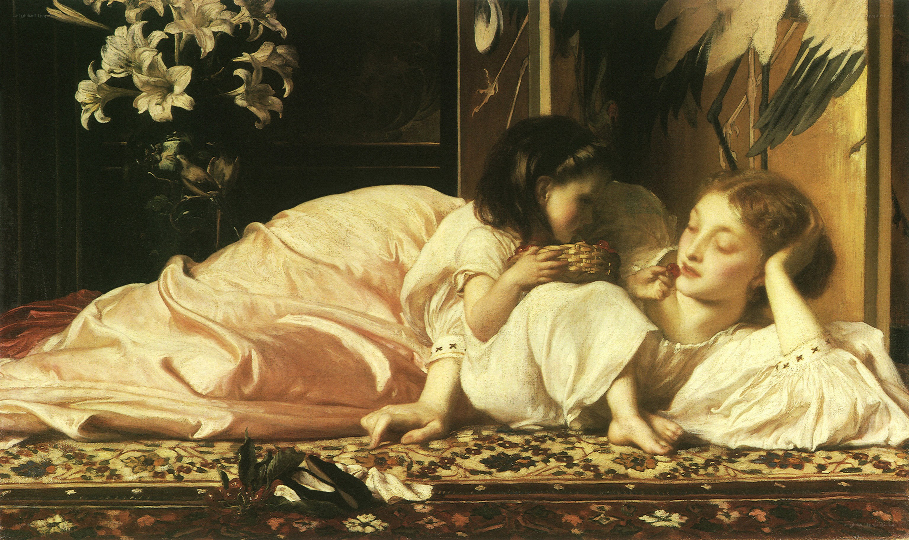 Two girls on a rug