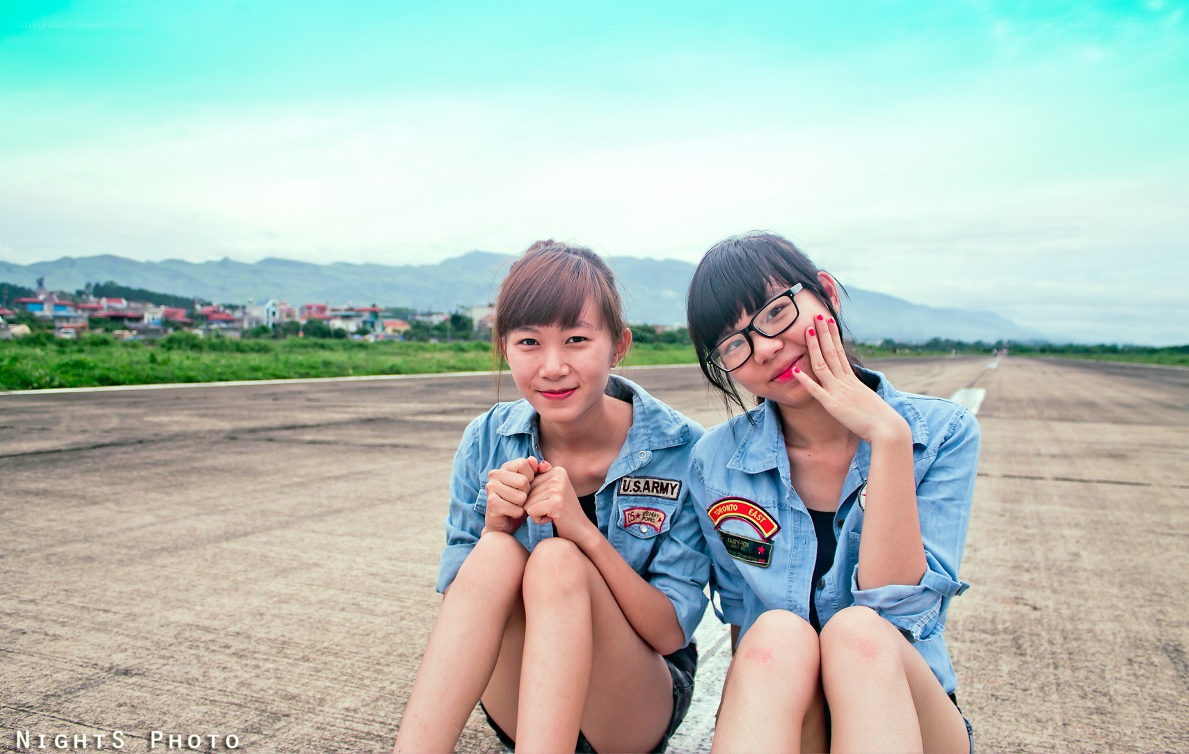 Two girls on a runway