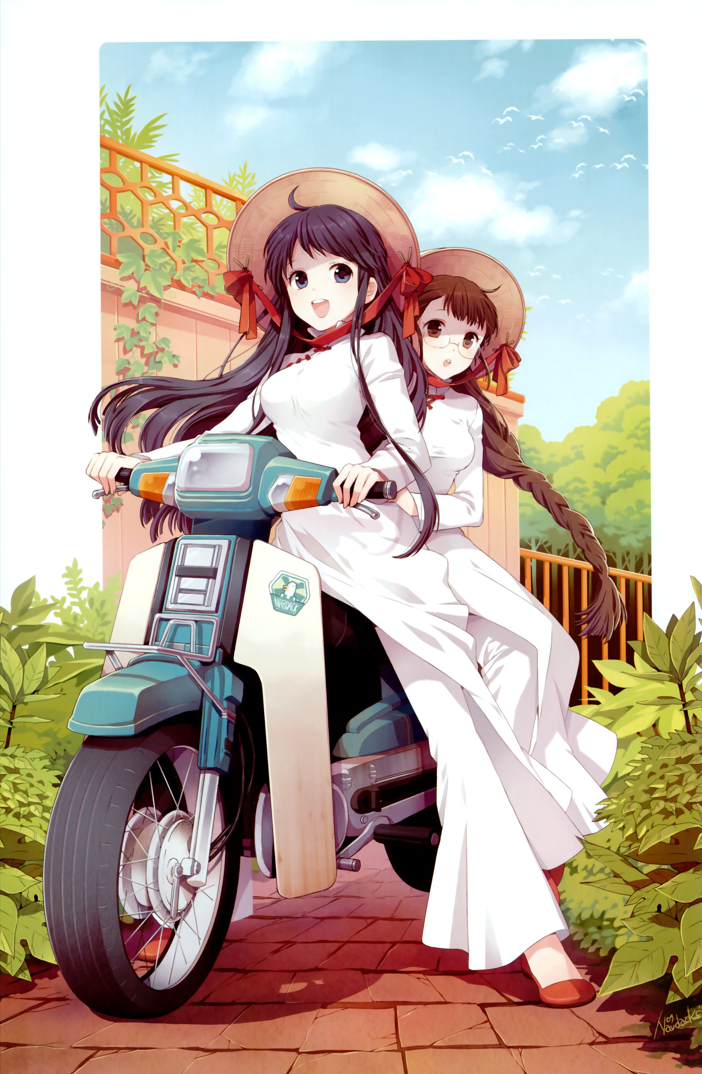 Two girls on a scooter