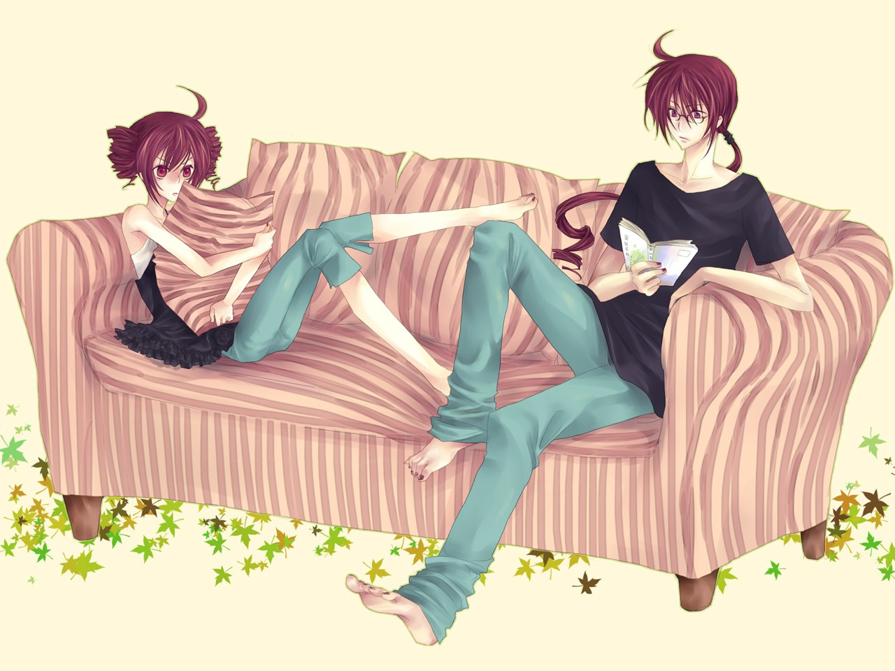 Two girls on a striped couch