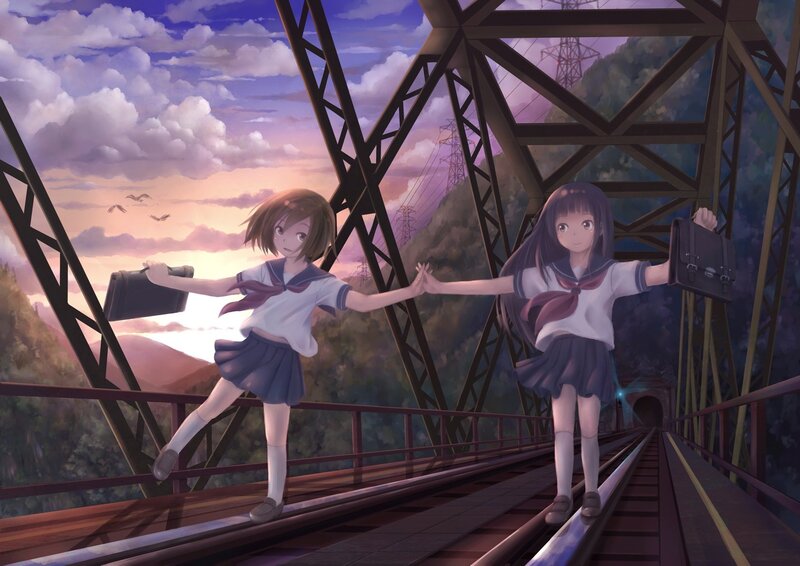 Two girls on a train bridge