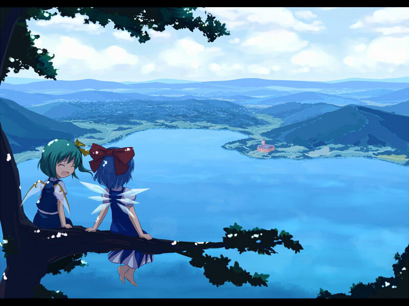 Two girls on a tree branch