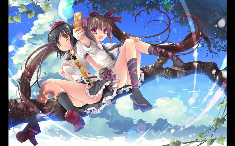 Two girls on a tree branch