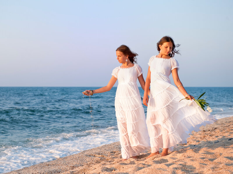 Two Girls on Beach — White, Serene, Sunset