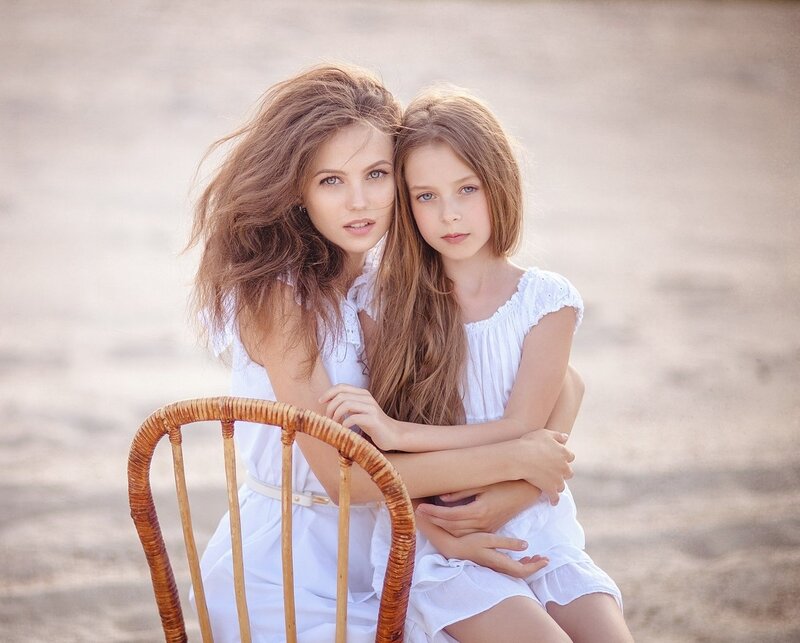 Two Girls on Chair