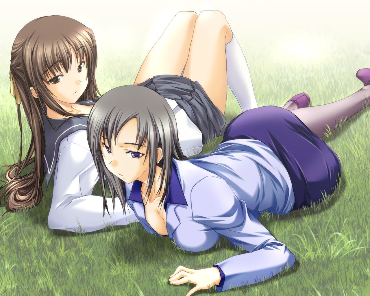 Two girls on grass