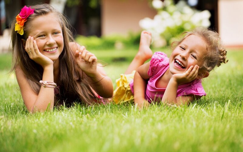 Two Girls on Grass — Green, Happy, Afternoon