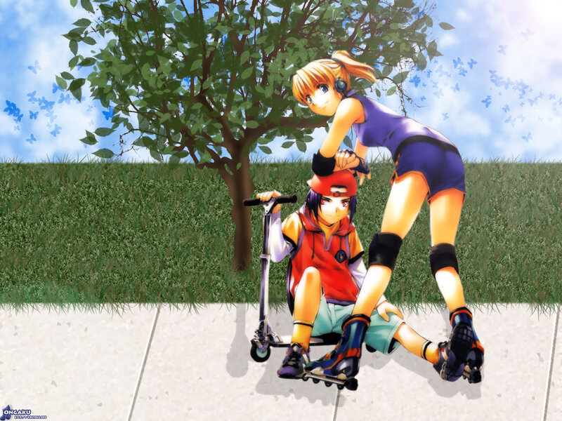 Two girls on scooters in park