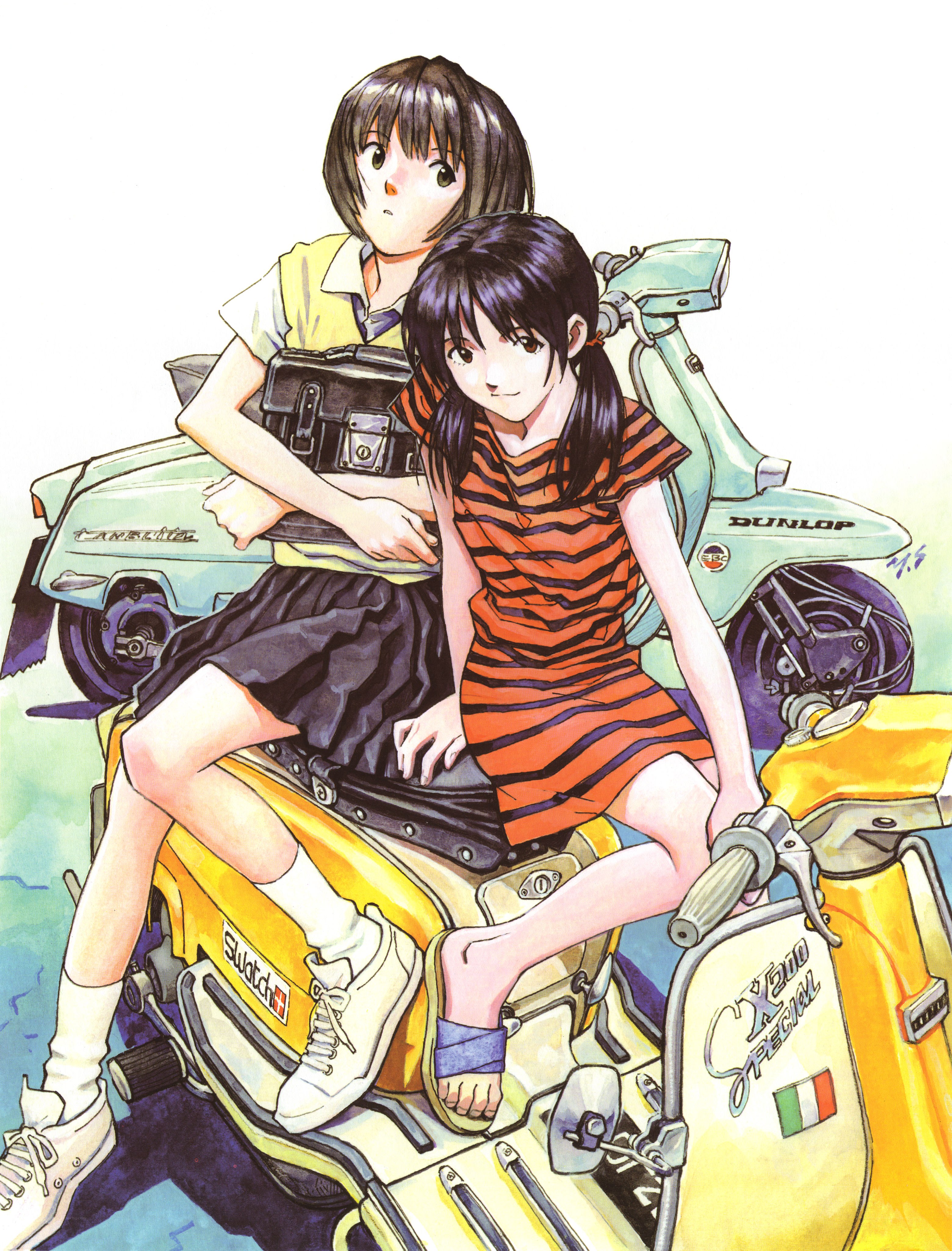 Two girls on scooters