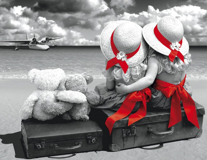 Two Girls on Suitcases