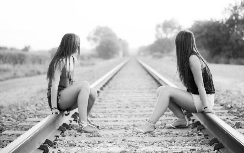 Two Girls on Train Tracks — Black, Contemplative
