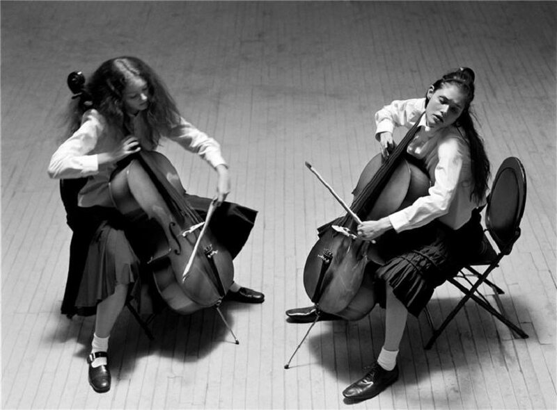 Two Girls Playing Cellos