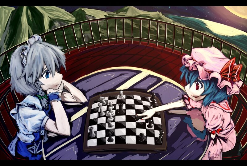 Two girls playing chess