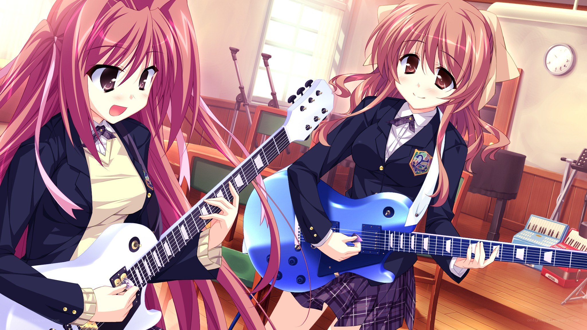 Two girls playing electric guitars