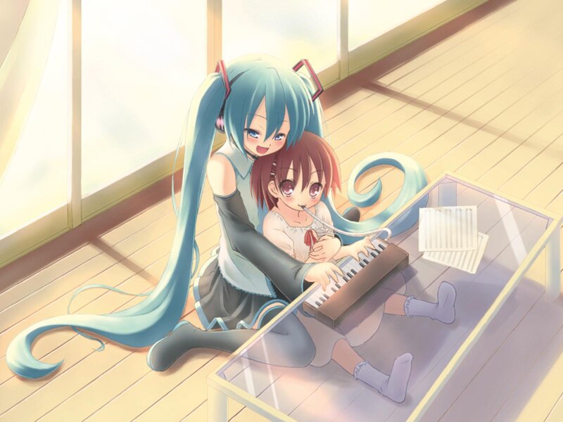 Two Girls Playing Keyboard