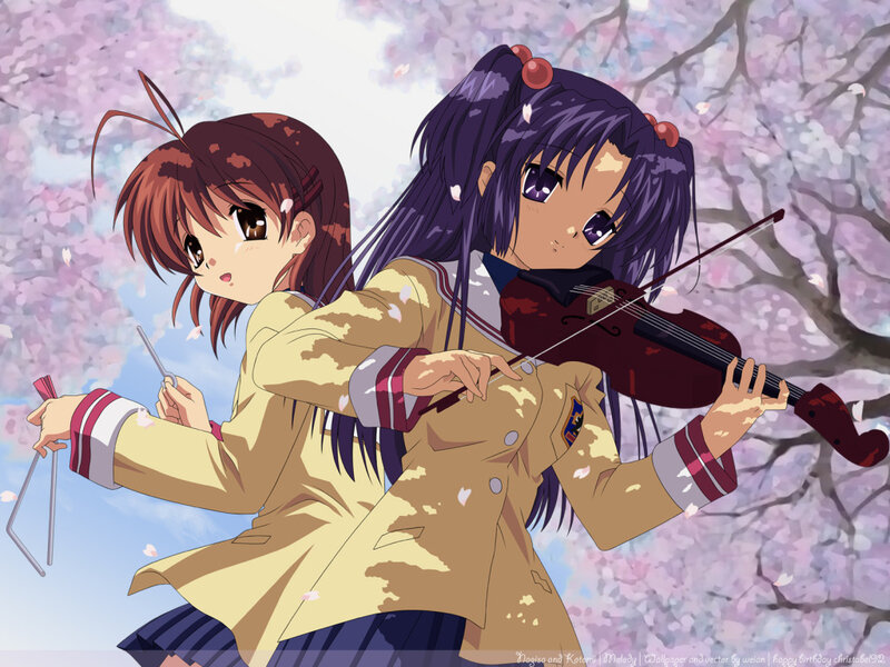 Two girls playing music under cherry blossoms