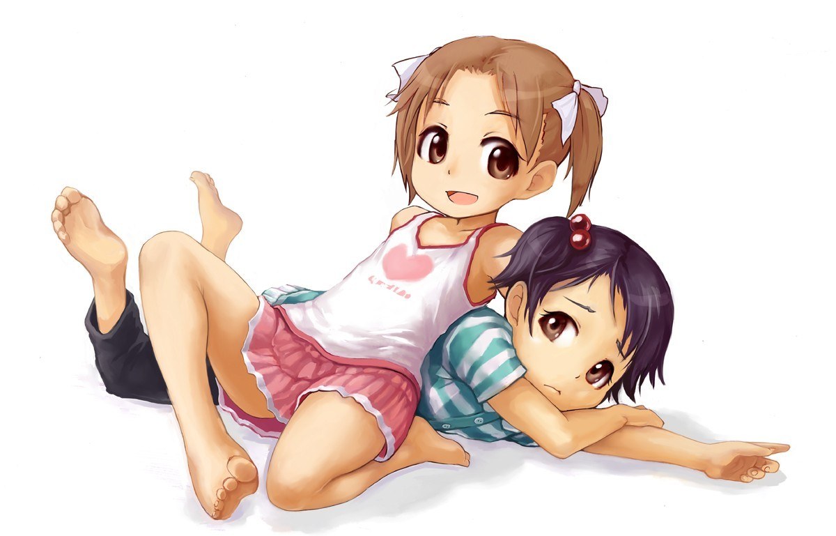 Two girls playing on the floor