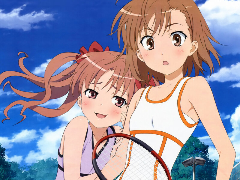 Two girls playing tennis