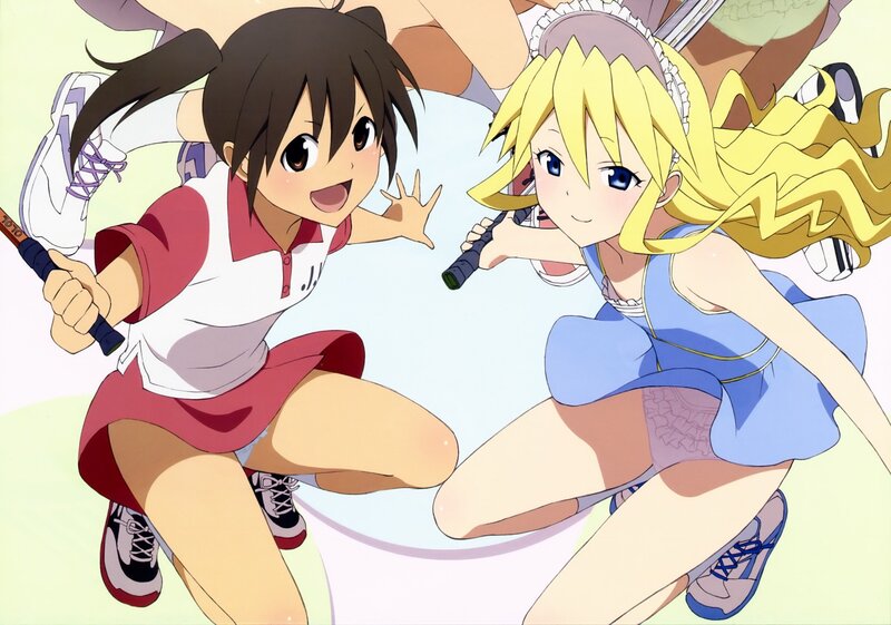 Two girls playing tennis
