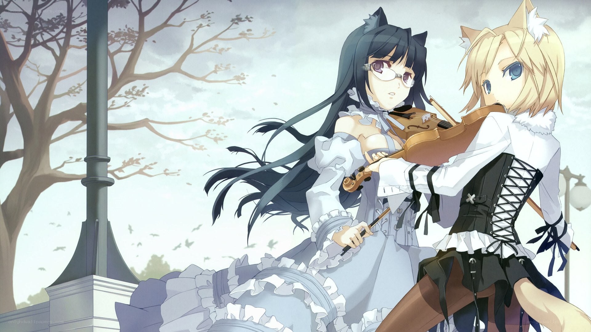Two girls playing violin together