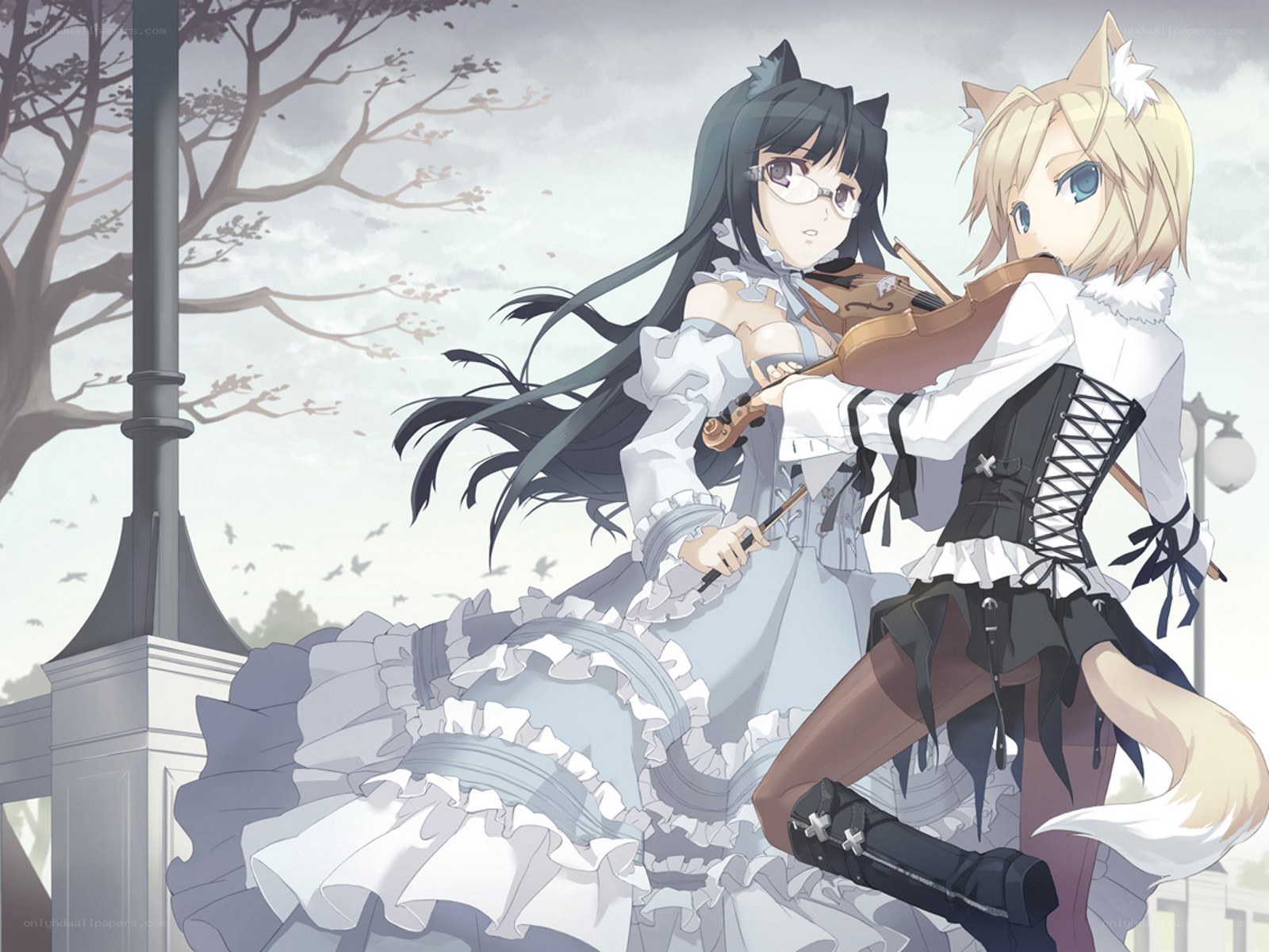 Two girls playing violin