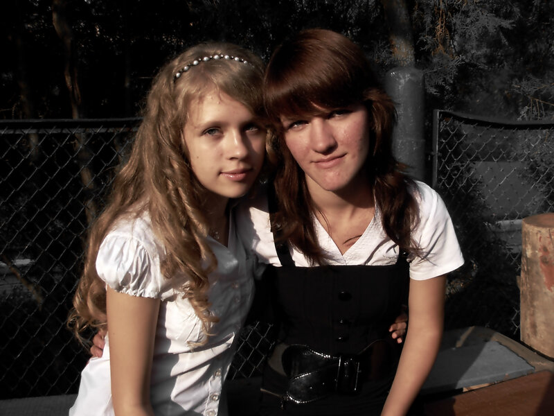 Two girls posing together