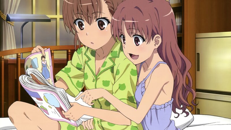 Two girls reading a magazine