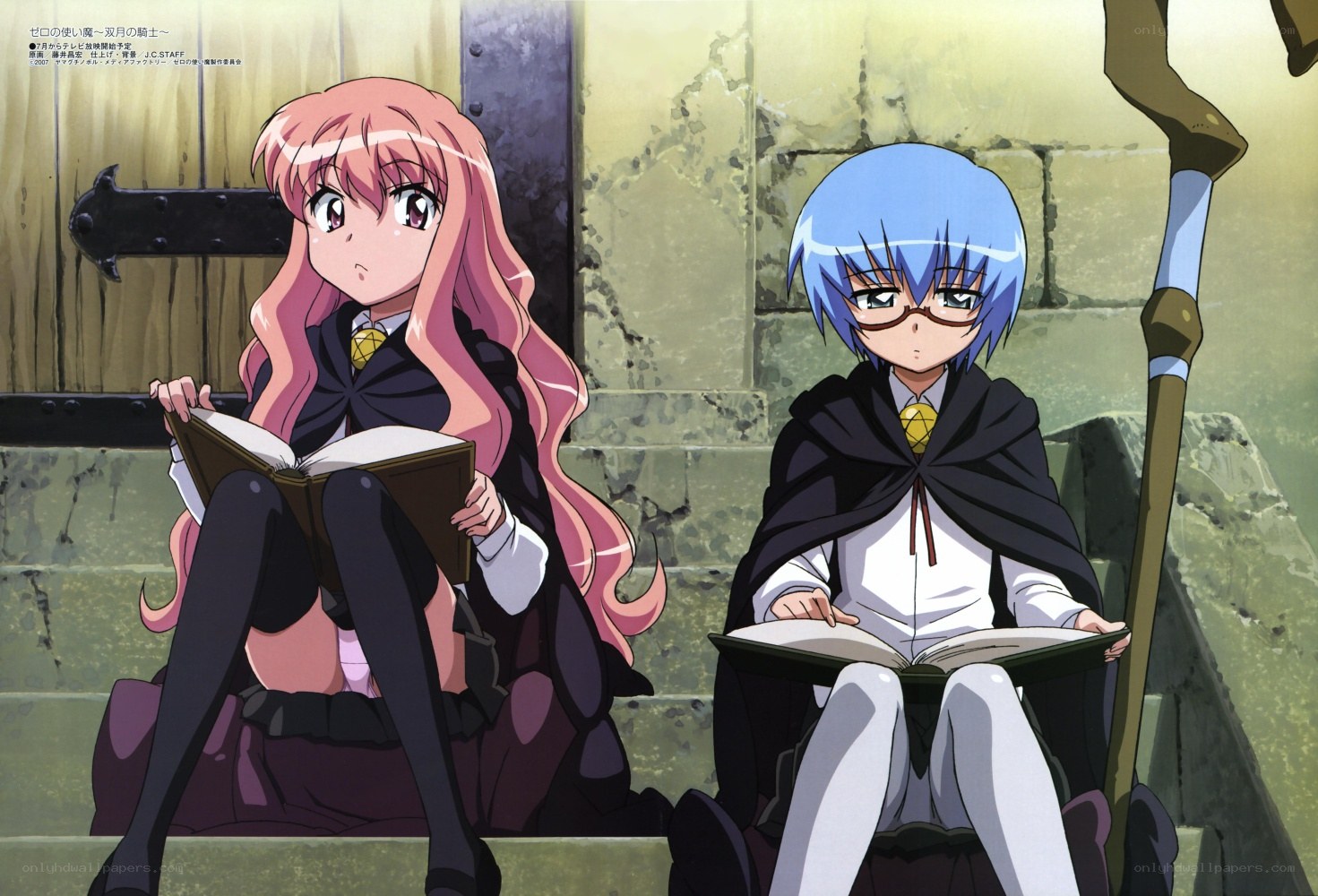 Two girls reading books