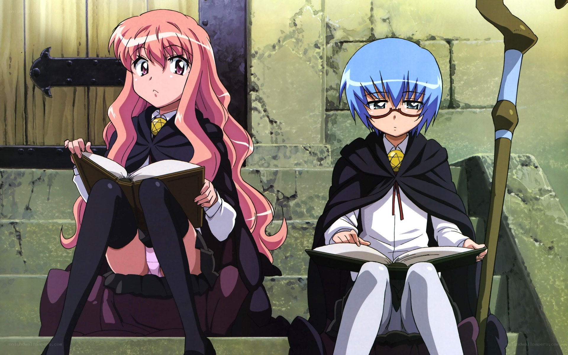 Two girls reading books