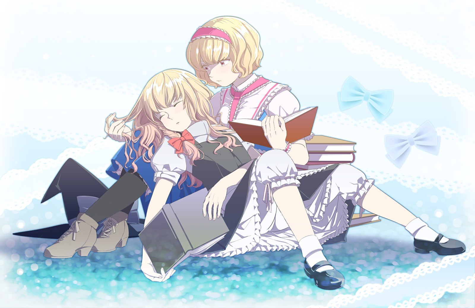 Two girls reading together