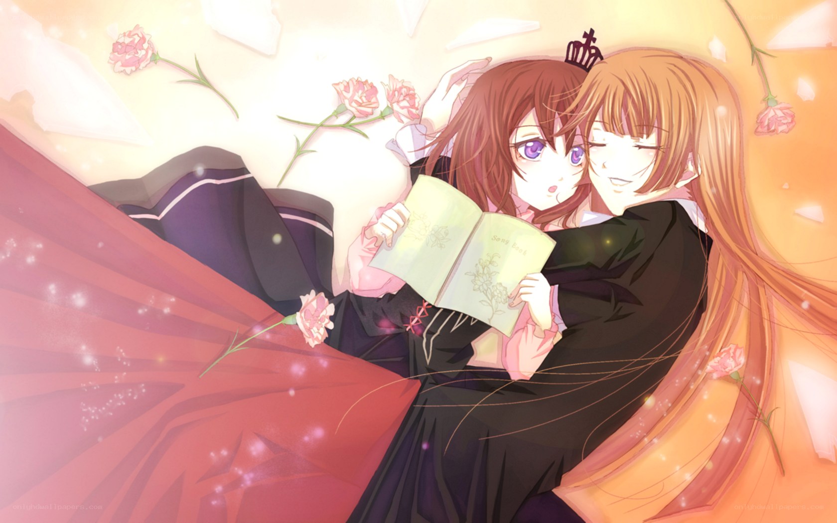Two girls reading together