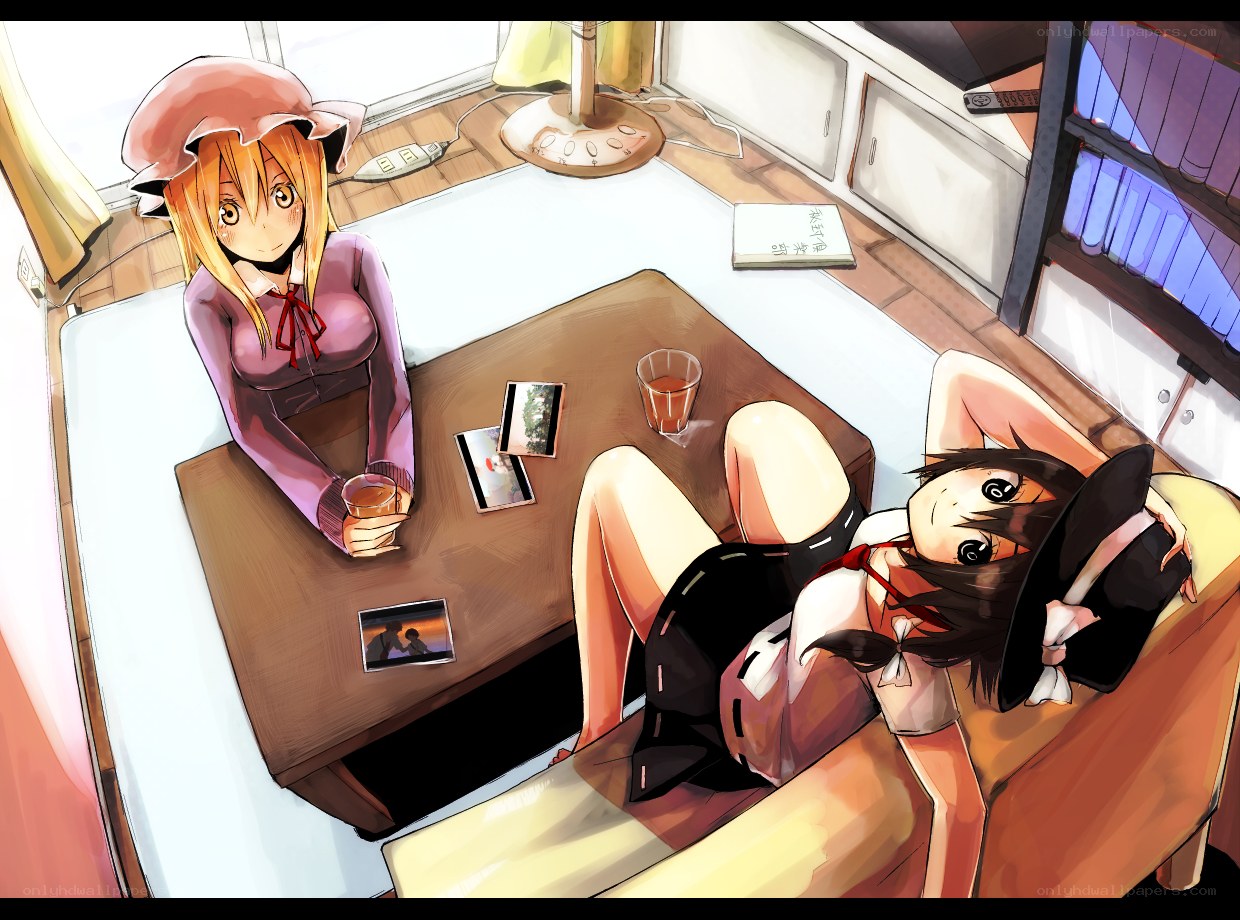 Two girls relaxing at home