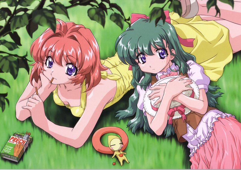 Two girls relaxing in the grass