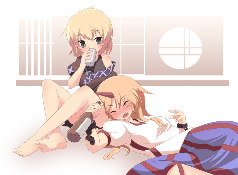 Two girls relaxing indoors
