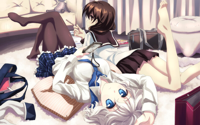 Two girls relaxing on the floor