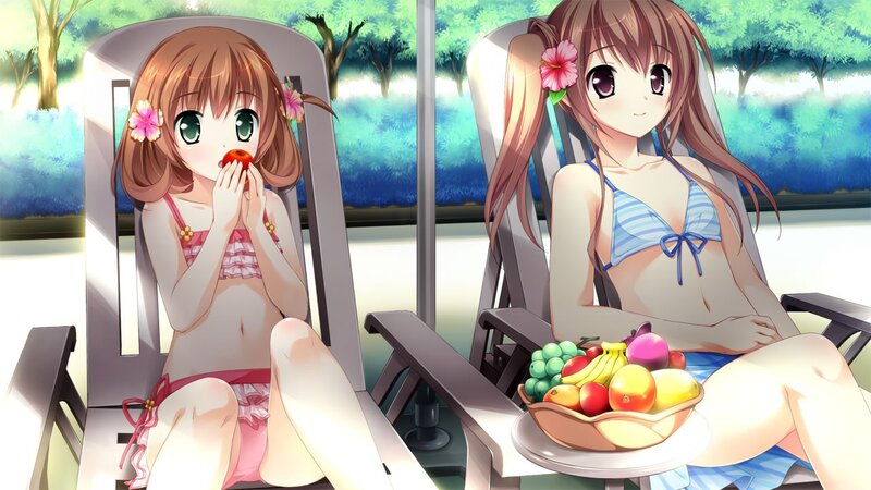 Two girls relaxing with fruit