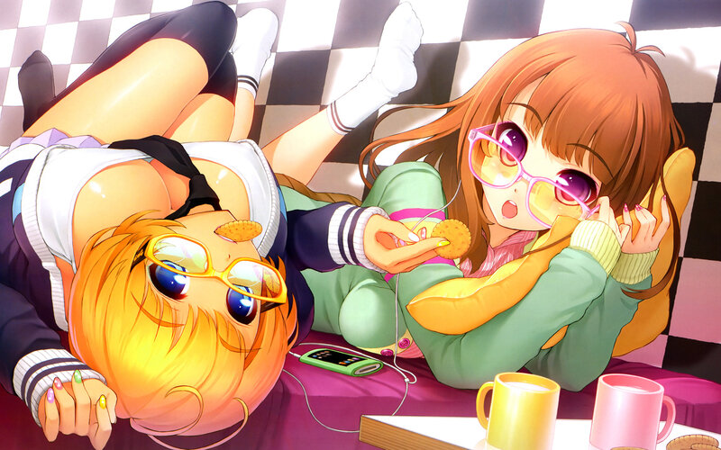 Two girls relaxing with snacks