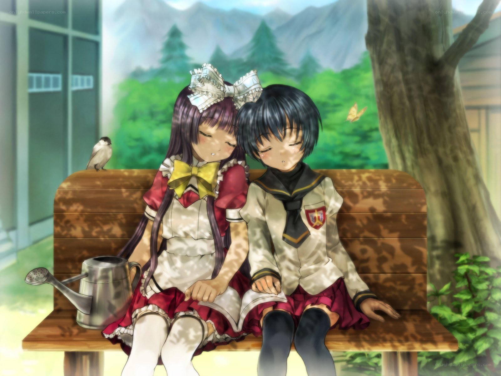 Two girls resting on a bench