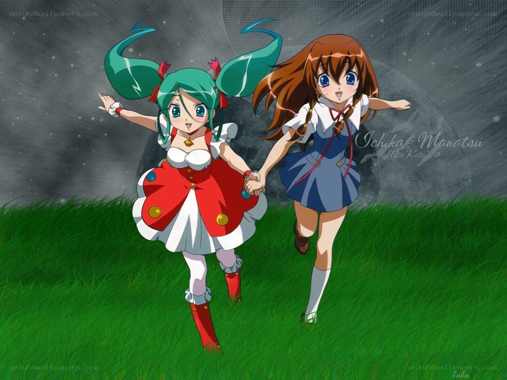 Two girls running in a field