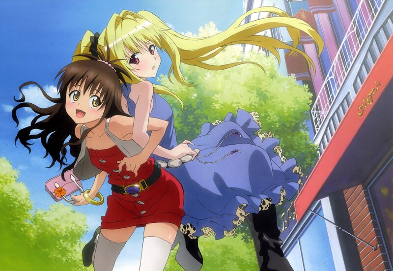 Two girls running in the city