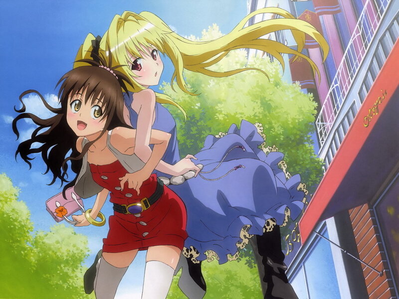 Two girls running in the city