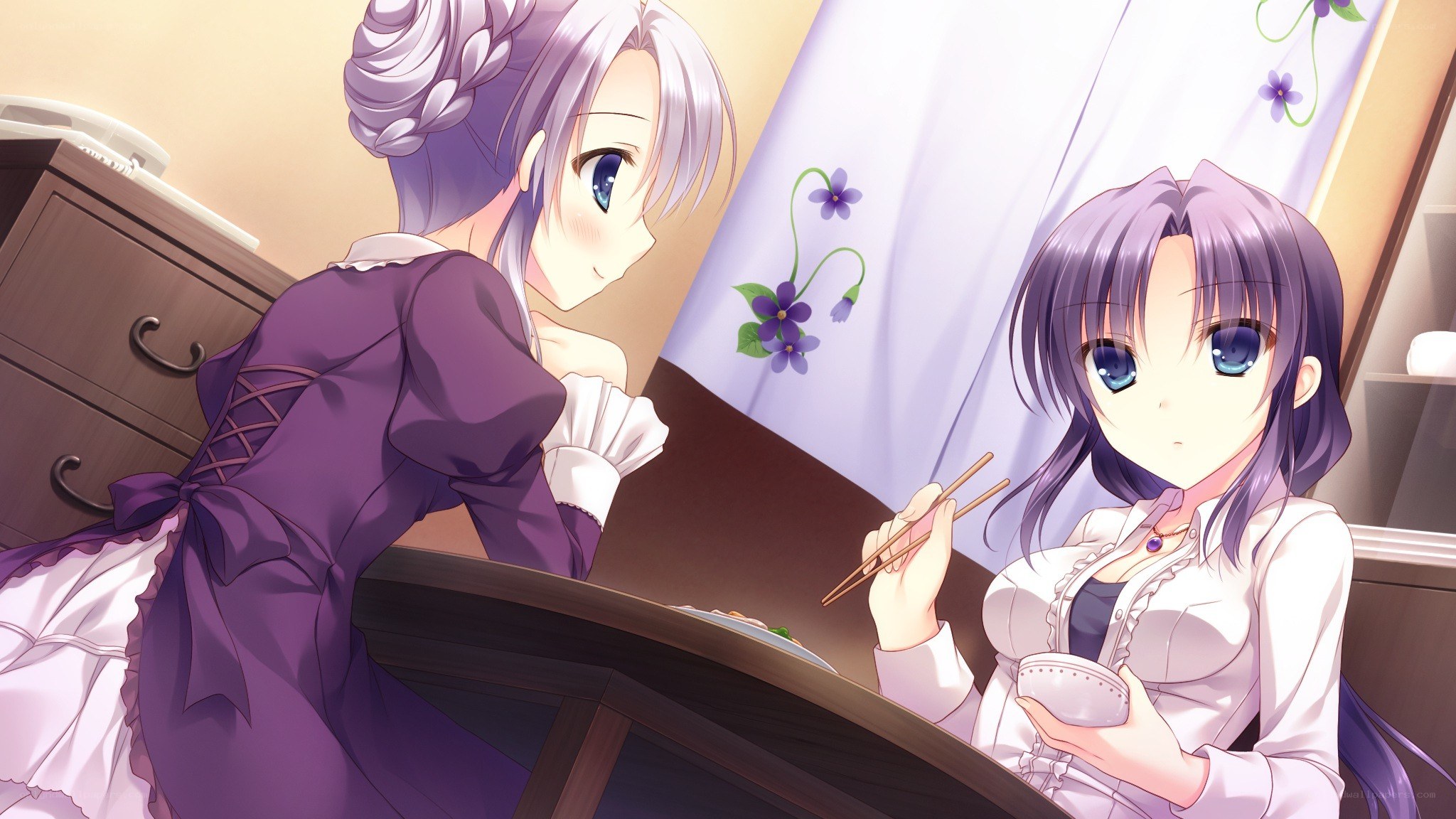 Two girls sharing a meal