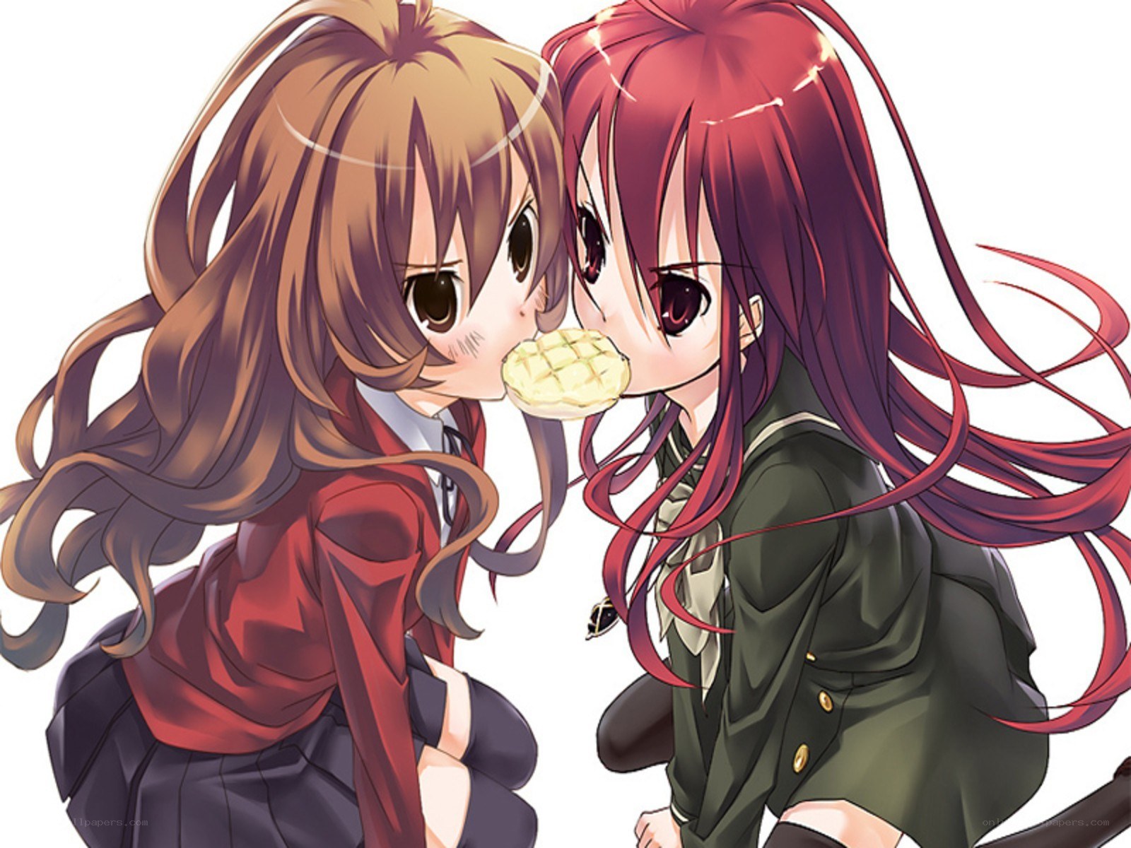 two girls sharing a snack
