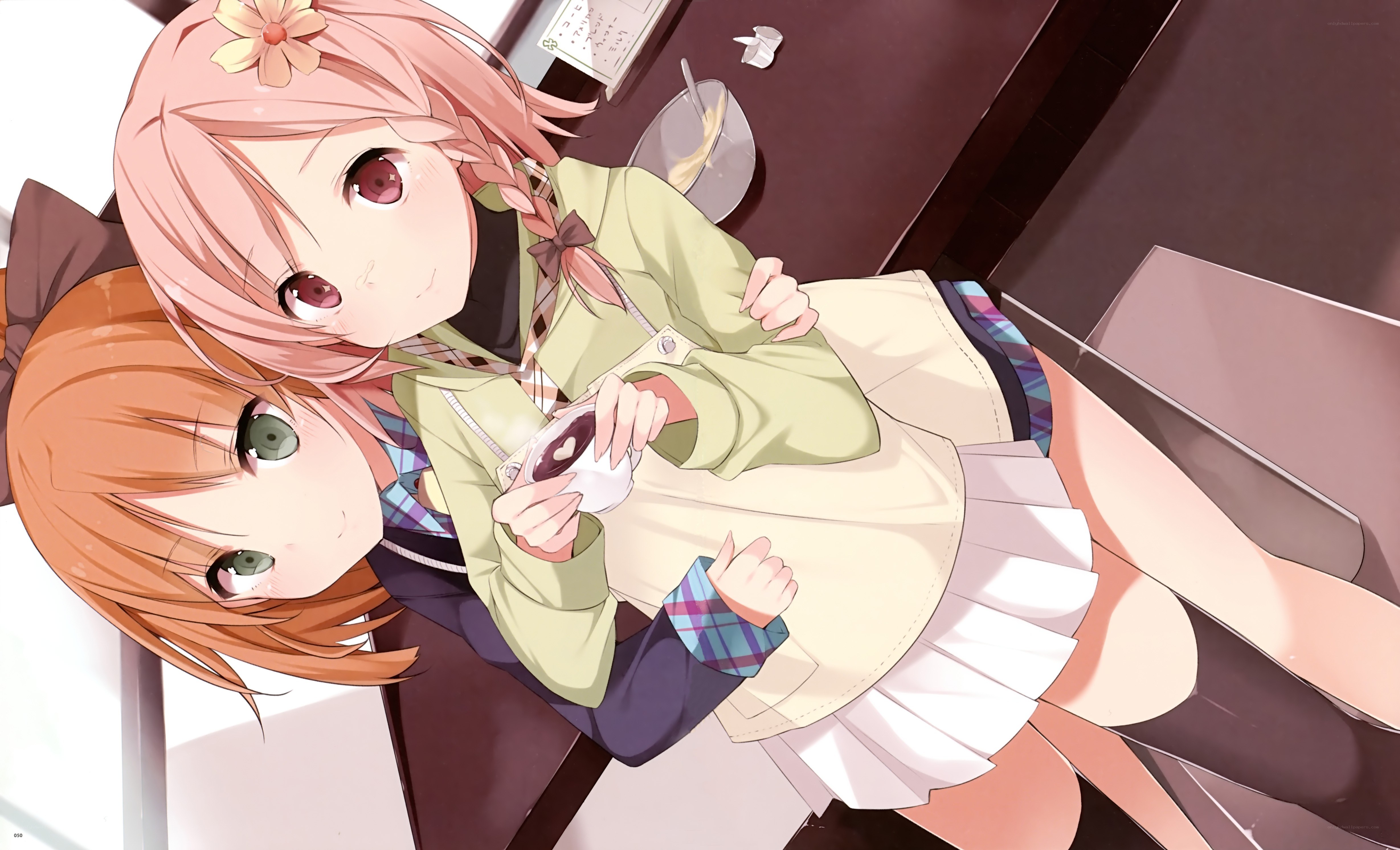 Two girls sharing a snack