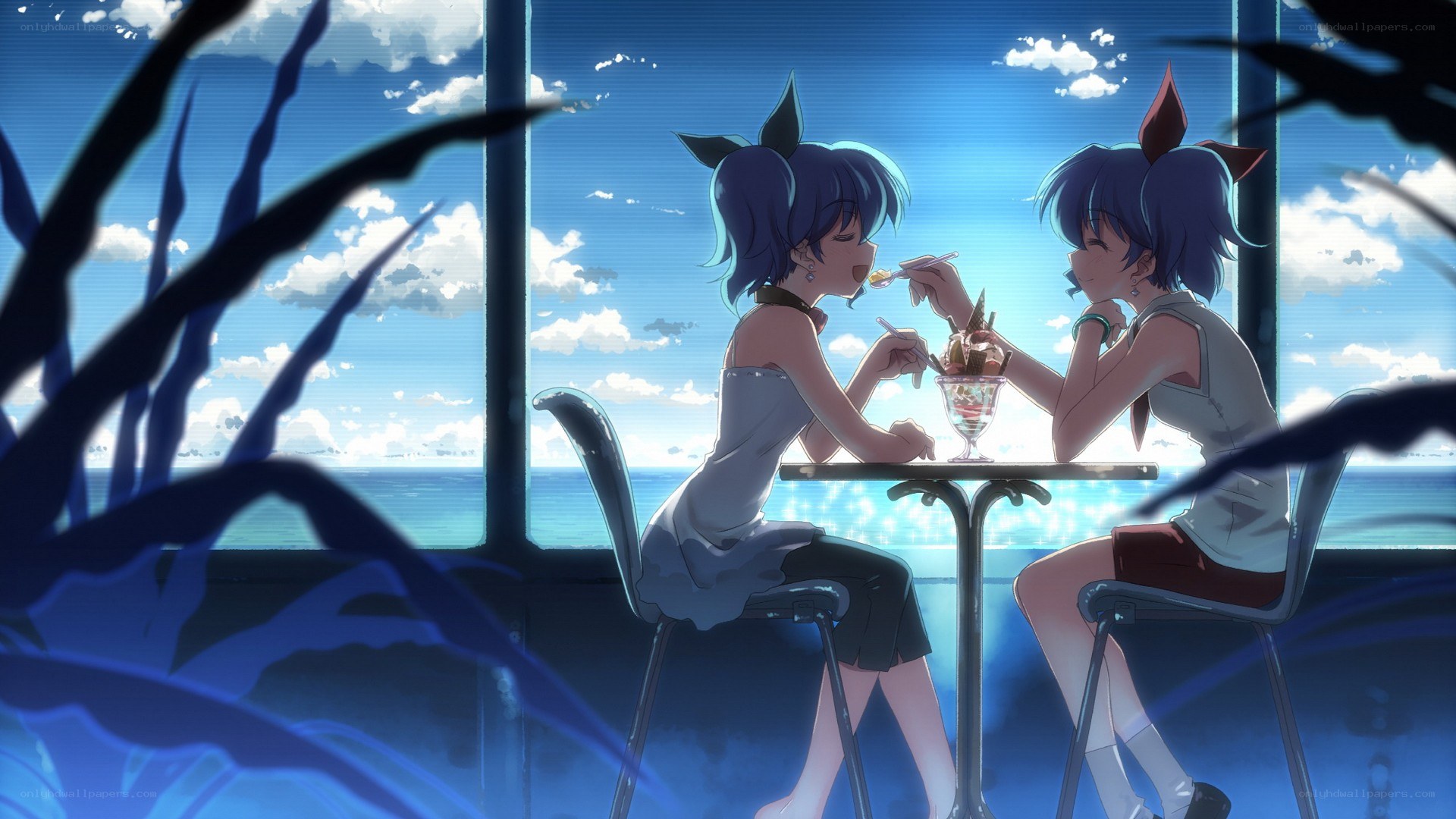 Two girls sharing dessert