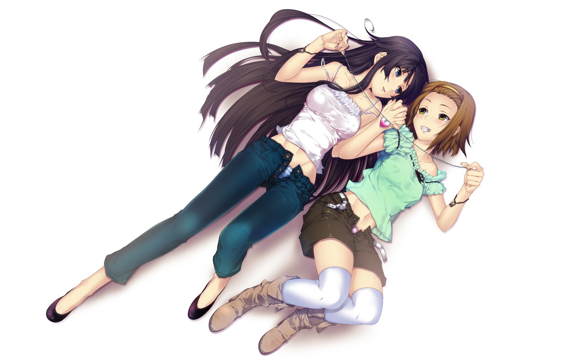 Two girls sharing headphones