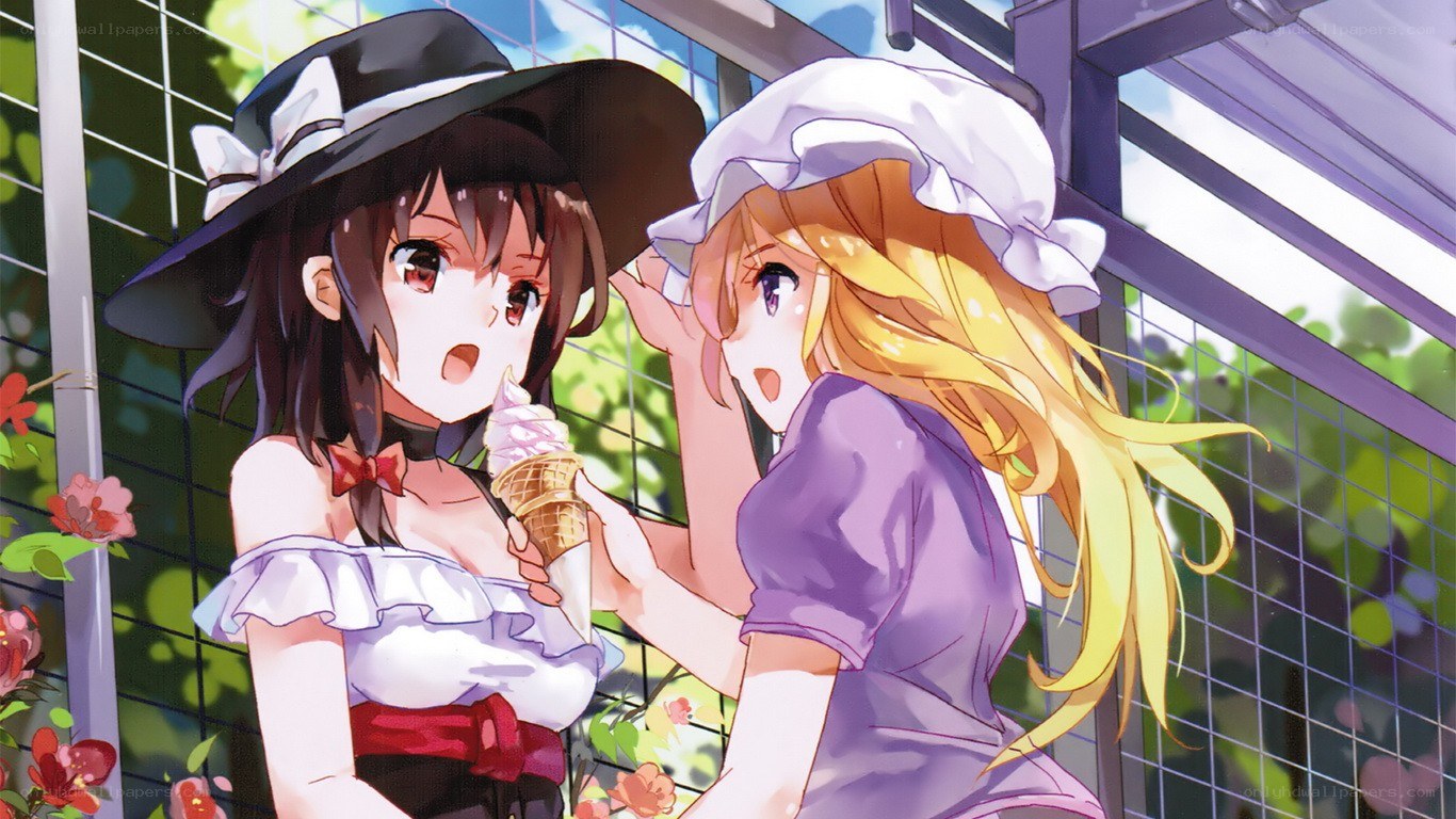 Two girls sharing ice cream